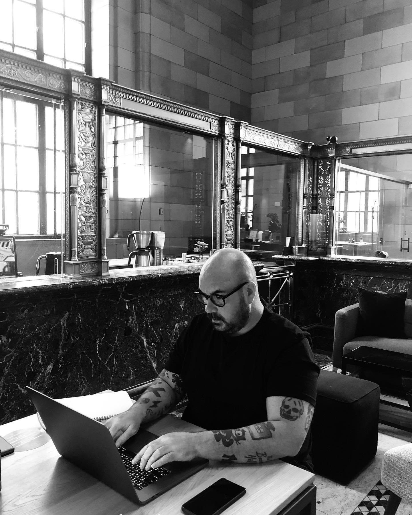Christopher Lee Sauvé at work by a window