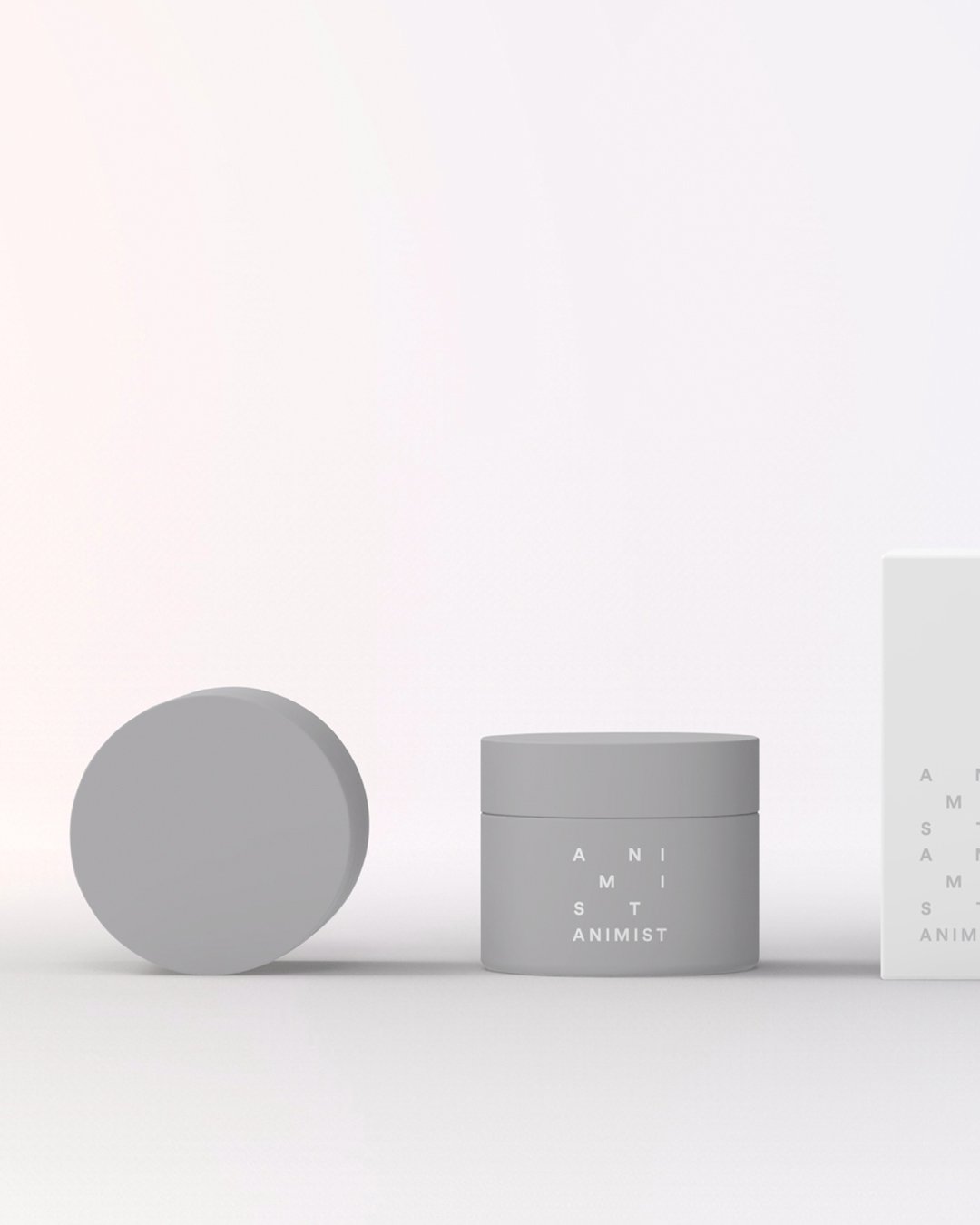 Animist jars in gray and white with the stacked mark