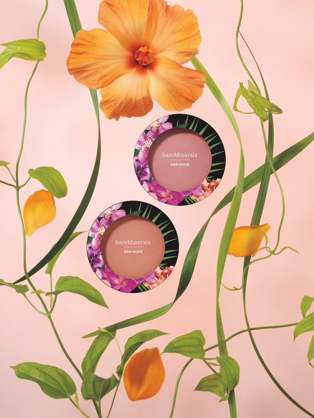 Two Gen Nude blush compacts among orange flowers and vines