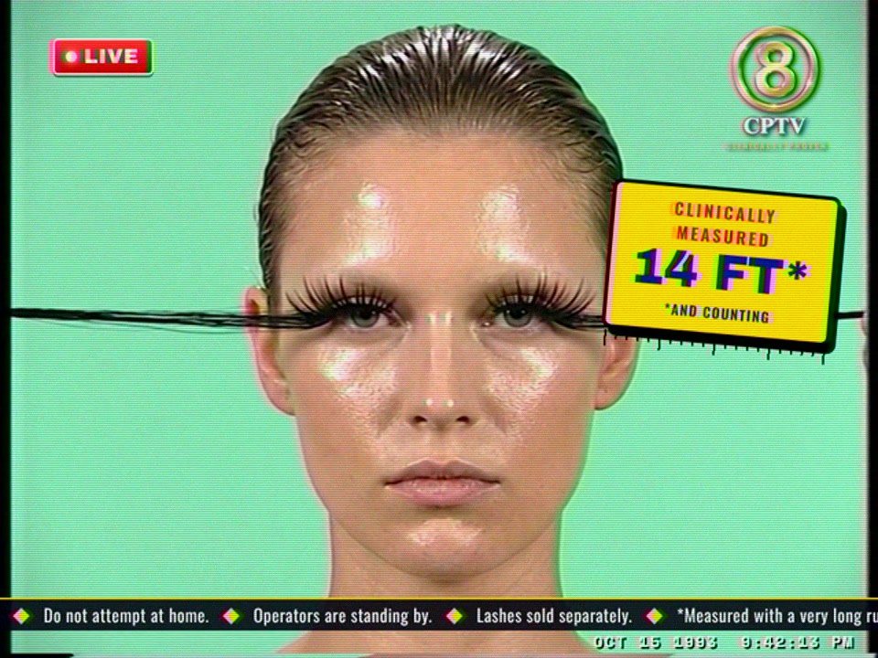 Ep. 02 in 4:3: close on the model, lashes stretched out of the frame, the tag Clinically measured 14 FT