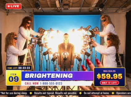 Style frame, item 09, Brightening: a model ringed by studio lights while assistants in dark goggles aim them at her