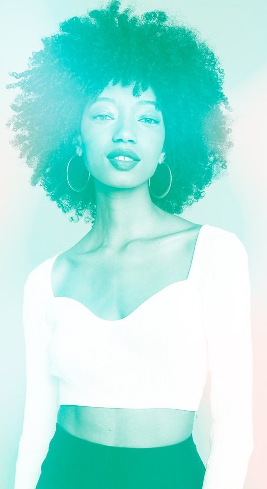 Natural curls in a teal duotone