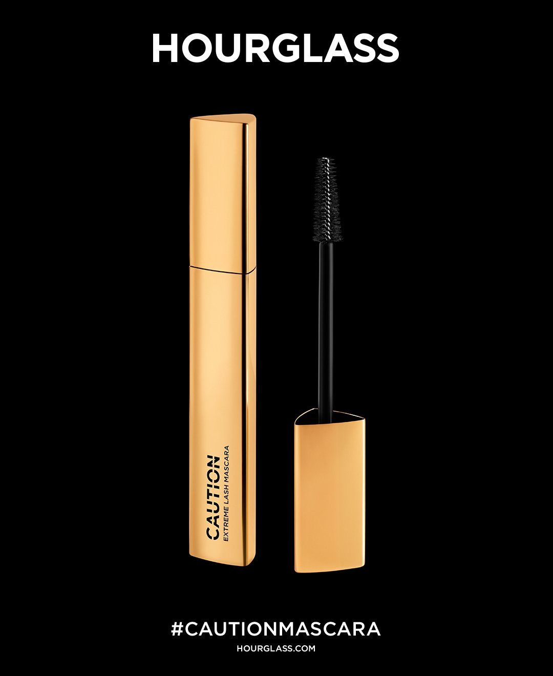 Poster: the gold CAUTION mascara and its wand on black, HOURGLASS above