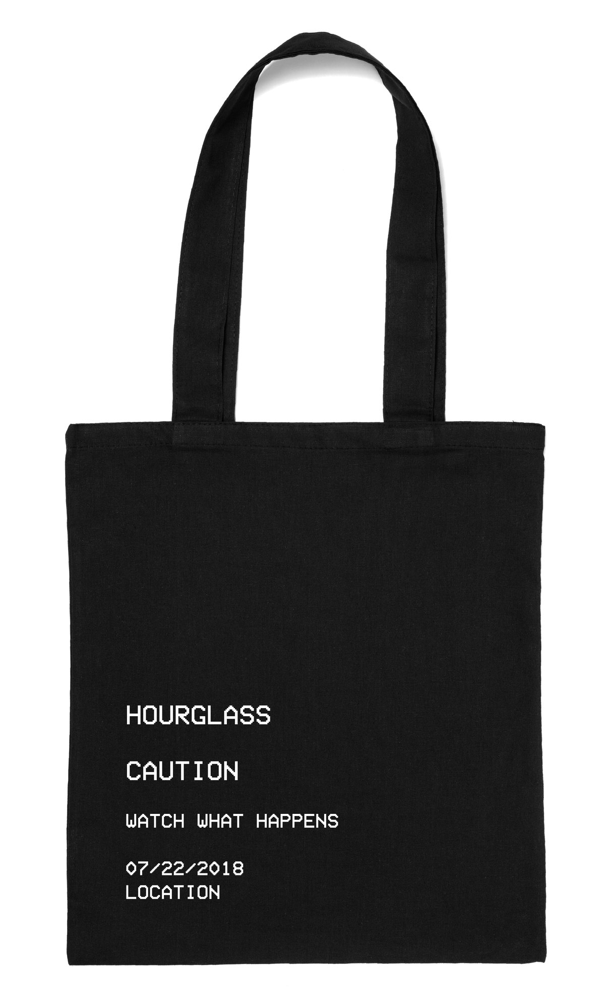 Black tote printed HOURGLASS, CAUTION, WATCH WHAT HAPPENS, 07/22/2018, LOCATION in pixel type