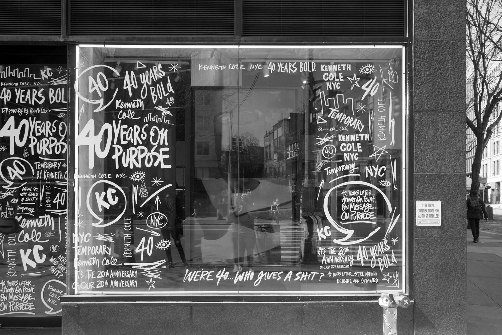 Kenneth Cole store window lettered for the 40th anniversary