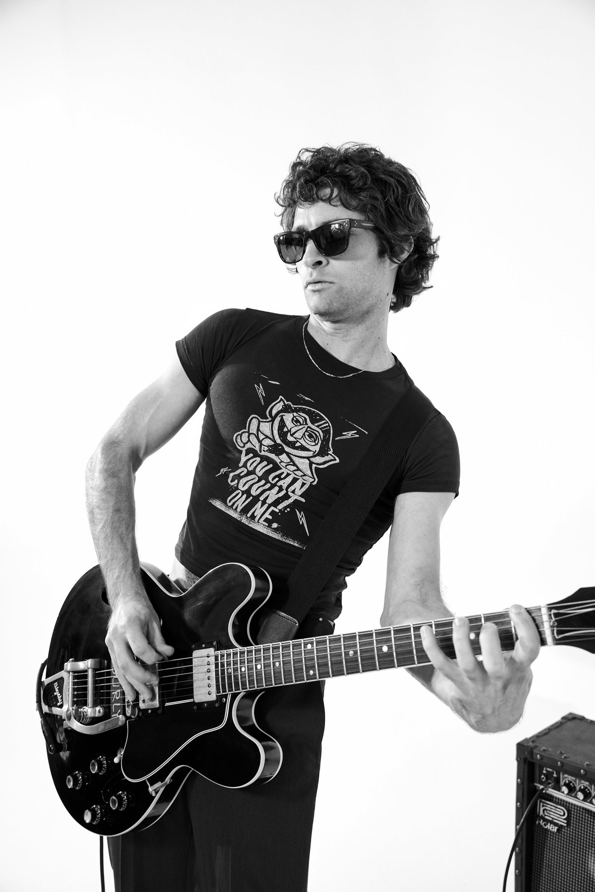 Guitarist in sunglasses in a Sesame Street x Kenneth Cole tee