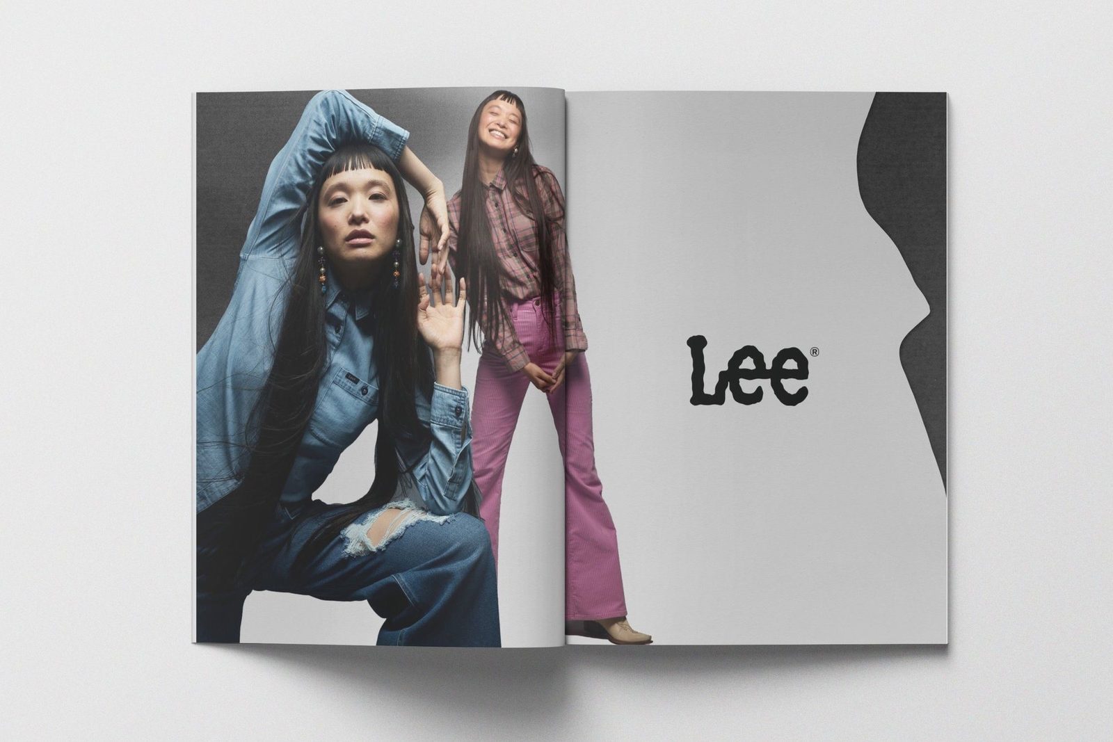 Book spread with a portrait in denim