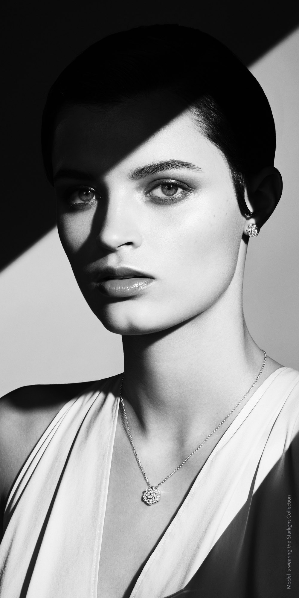 Influencer card front: a black and white portrait in hard light