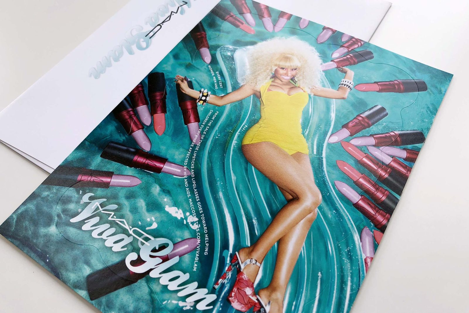 Viva Glam campaign print on teal water