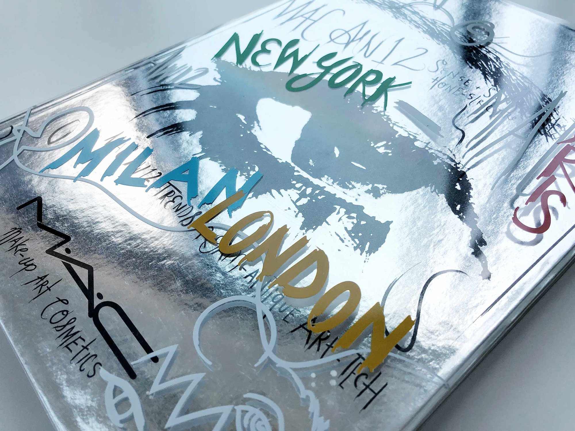 AW12 trend book covers in silver with New York and London in color
