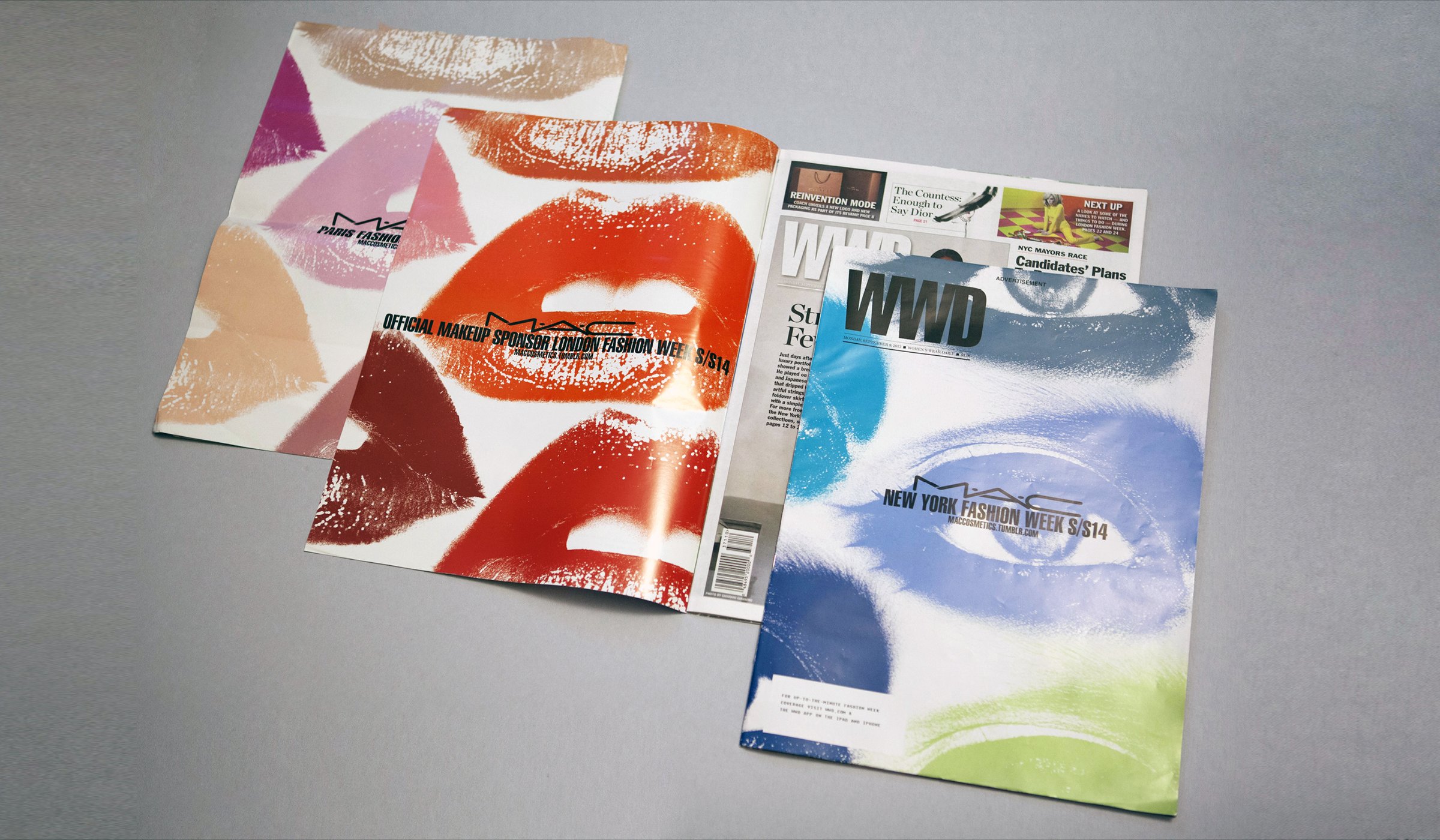 Fashion Week trend books and WWD covers fanned out