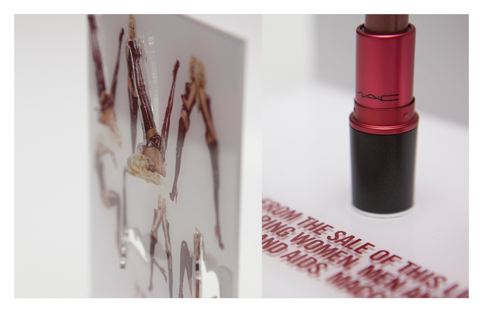 Detail of the cut-out letters and the lipstick, with the cause line printed on the base