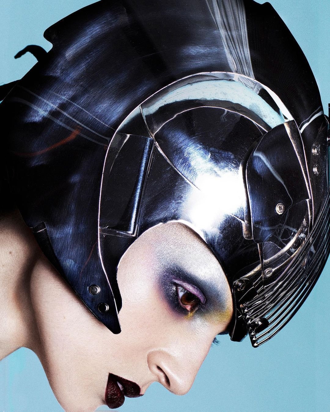 Campaign portrait in a chrome helmet
