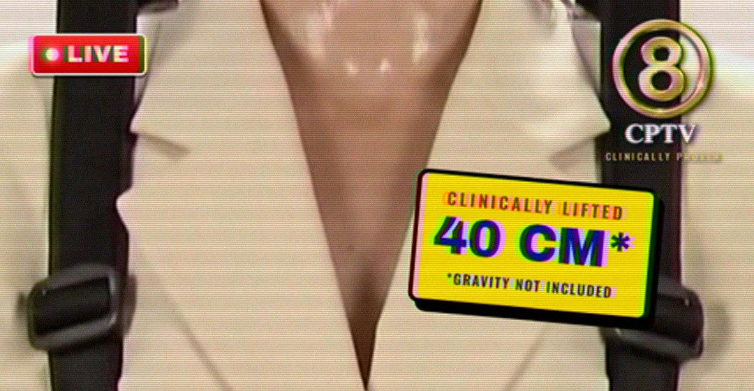 The LIVE tag, the CPTV 8 bug and the claim tag Clinically lifted 40 cm, gravity not included, over the cream suit