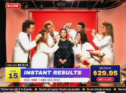 Style frame, item 15, Instant Results: a crowd of lab coat assistants doing a seated model’s makeup all at once