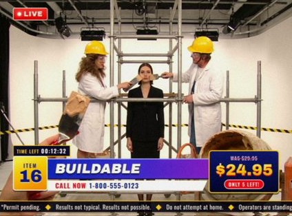 Style frame, item 16, Buildable: a model standing inside scaffolding while assistants in hard hats work around her