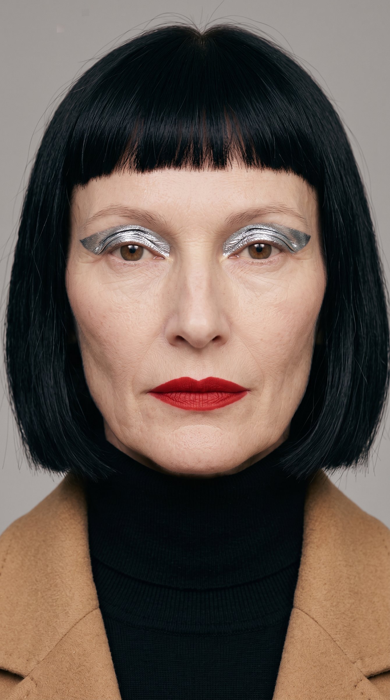 Odile, look 001: chrome lids, a red lip and the black bob