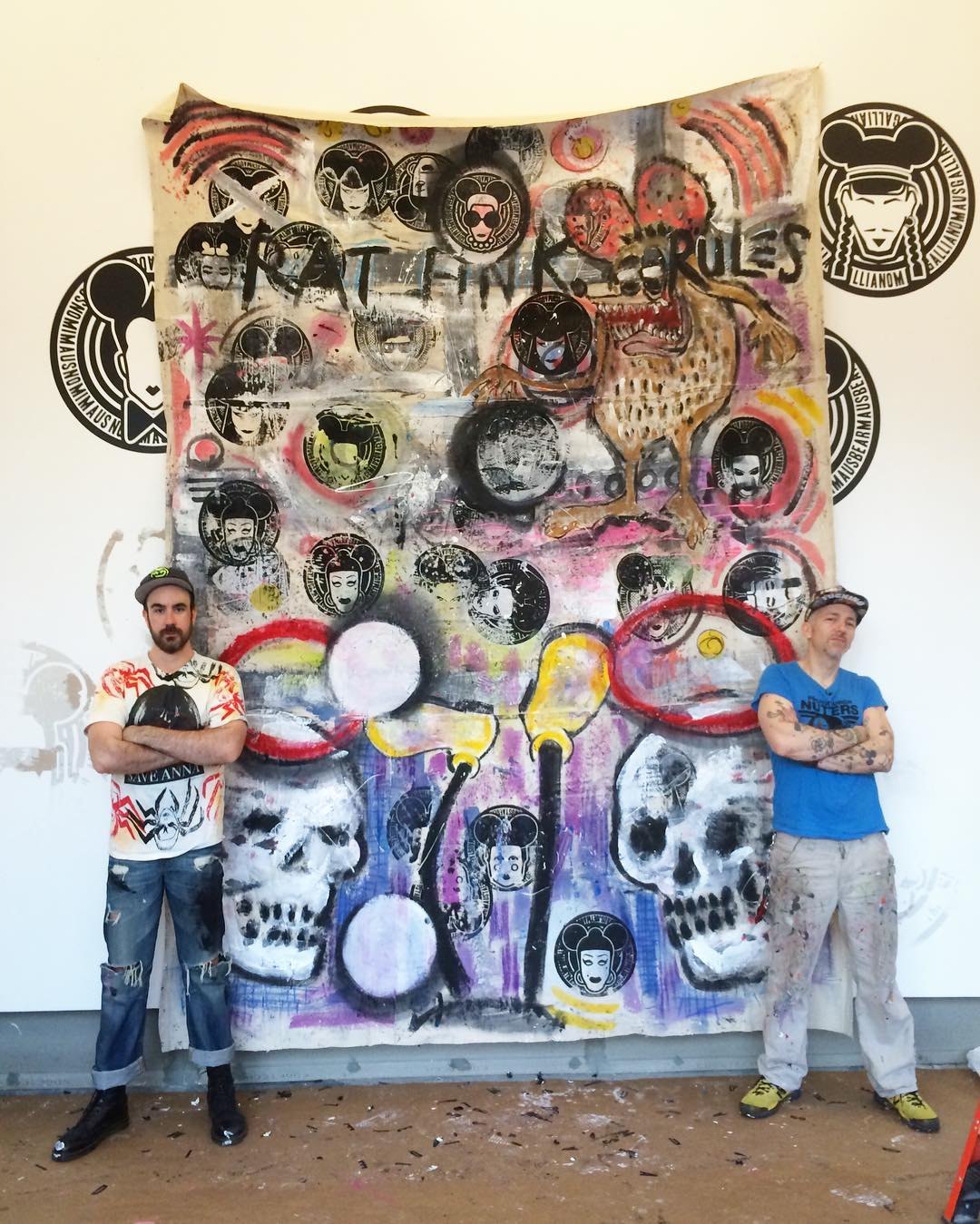 Scooter LaForge and Christopher Lee Sauvé in front of a big painted canvas, 2015