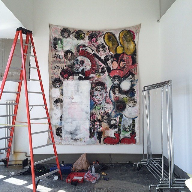 The painted canvas going up