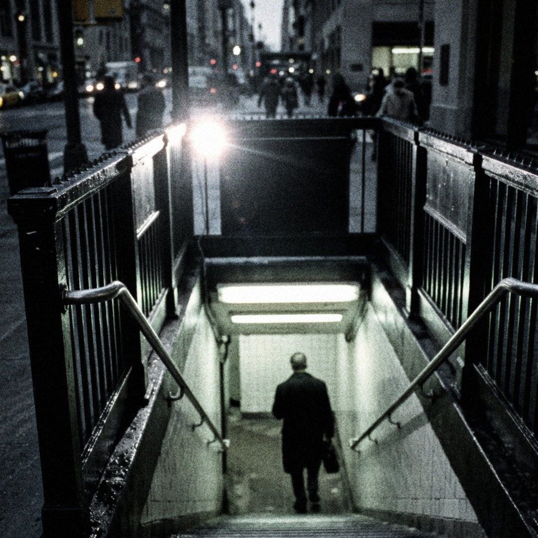 Subway stairs going down under a hard light