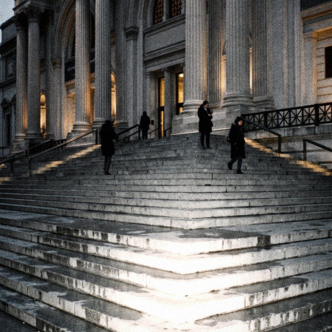 The Met steps in grey light