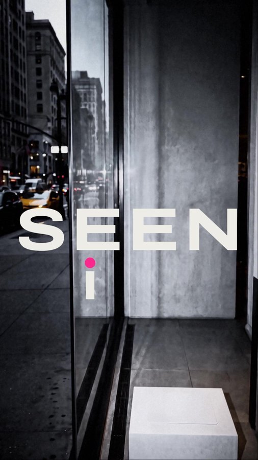 The title building: SEEN and the dot of the i