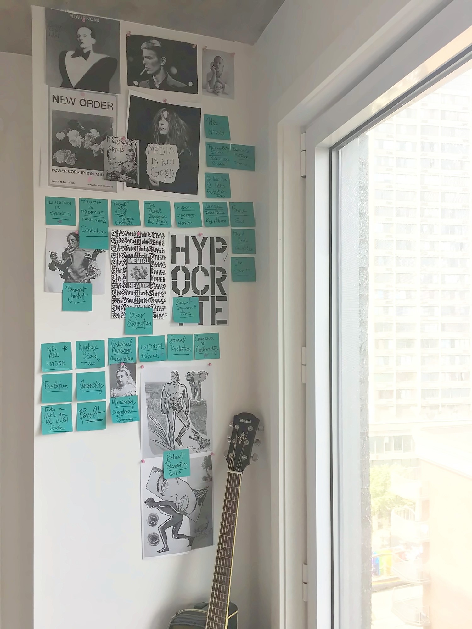 A wall of sticky notes and references