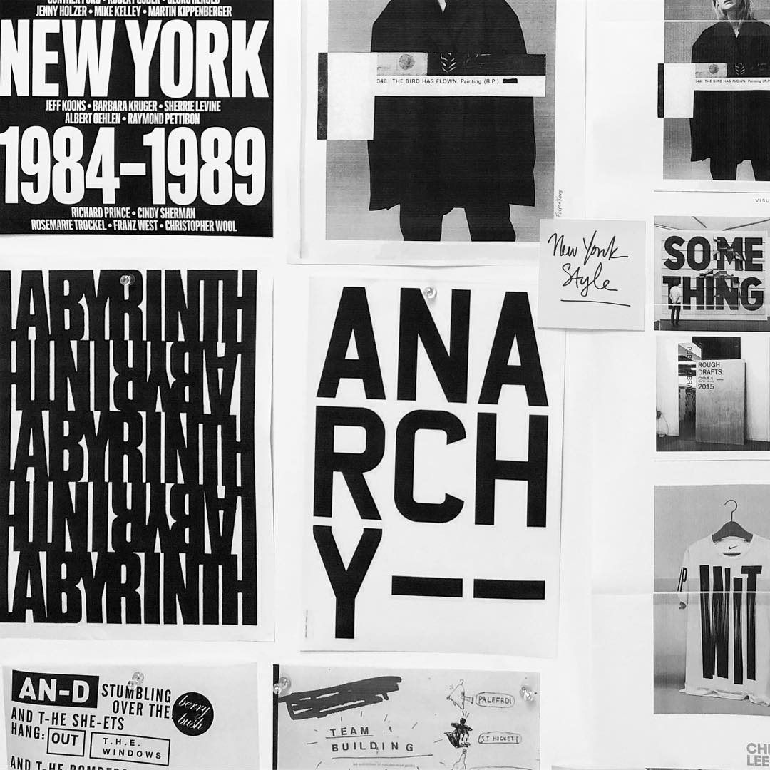 A wall of type posters and tear sheets