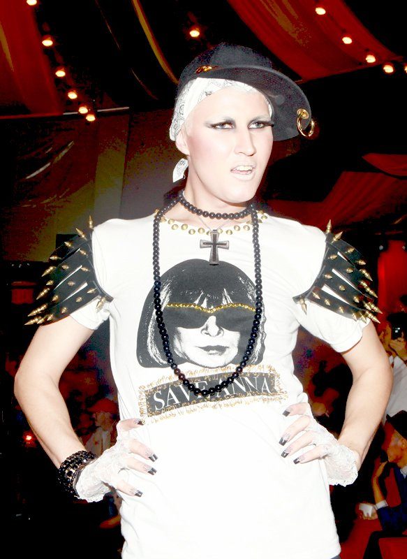 Club kid in a studded Save Anna tee