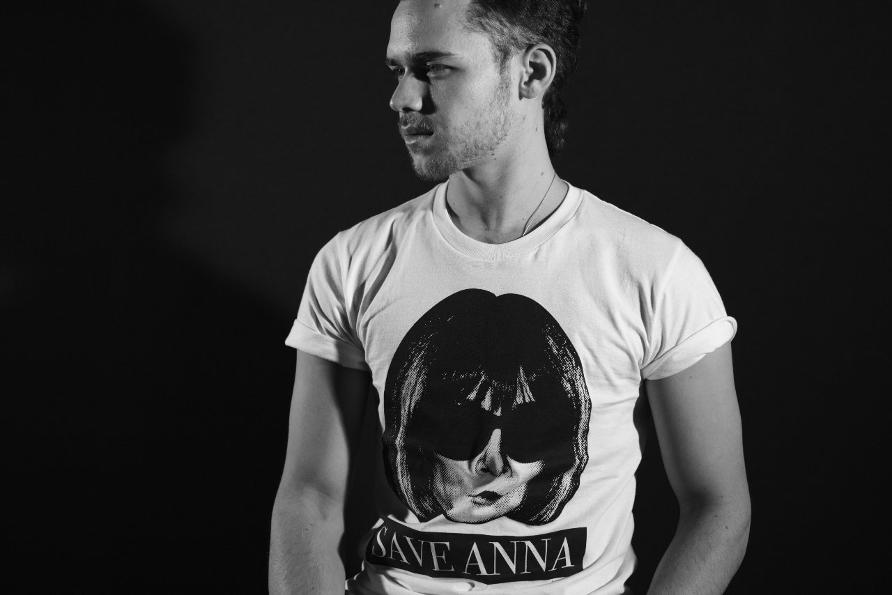 Save Anna tee in a dark studio