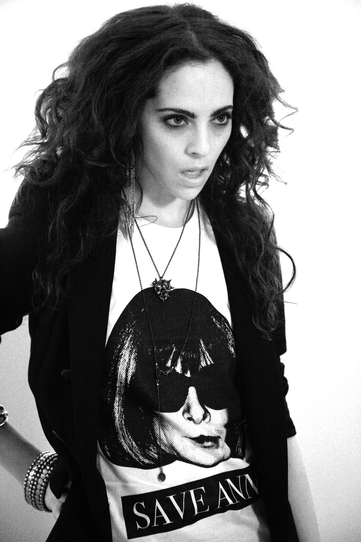 Save Anna editorial: model in a black blazer over the tee, black and white
