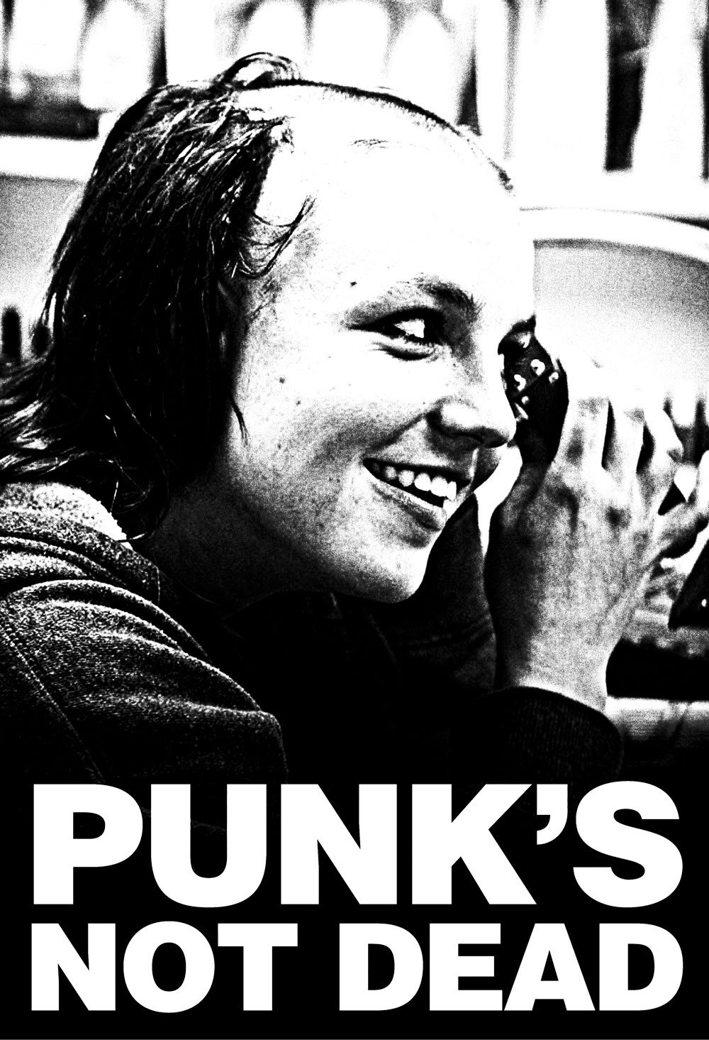 Punks Not Dead: portrait over heavy block type