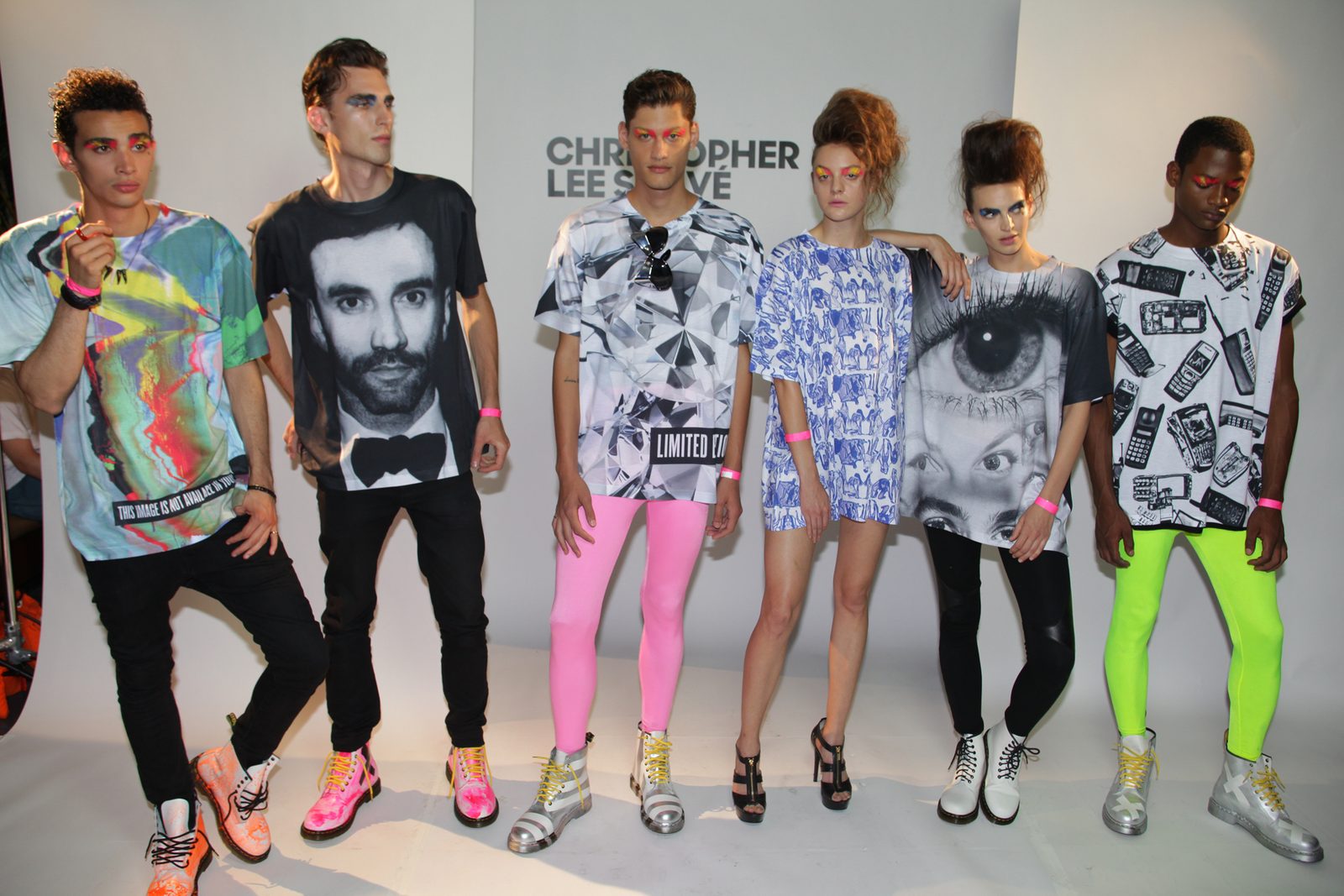 Lineup in printed tees and pink tights