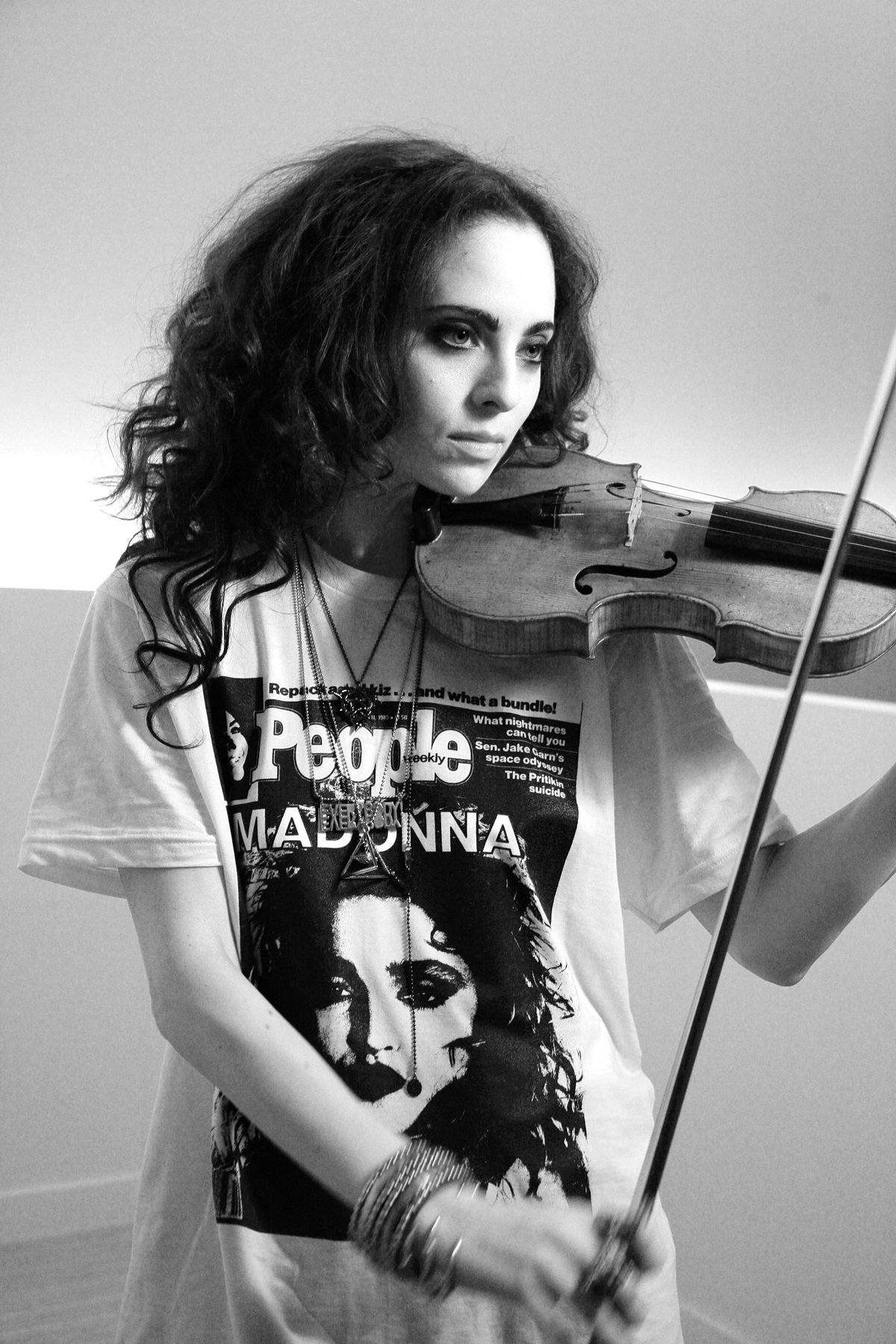 Violinist in the People Madonna tee, close