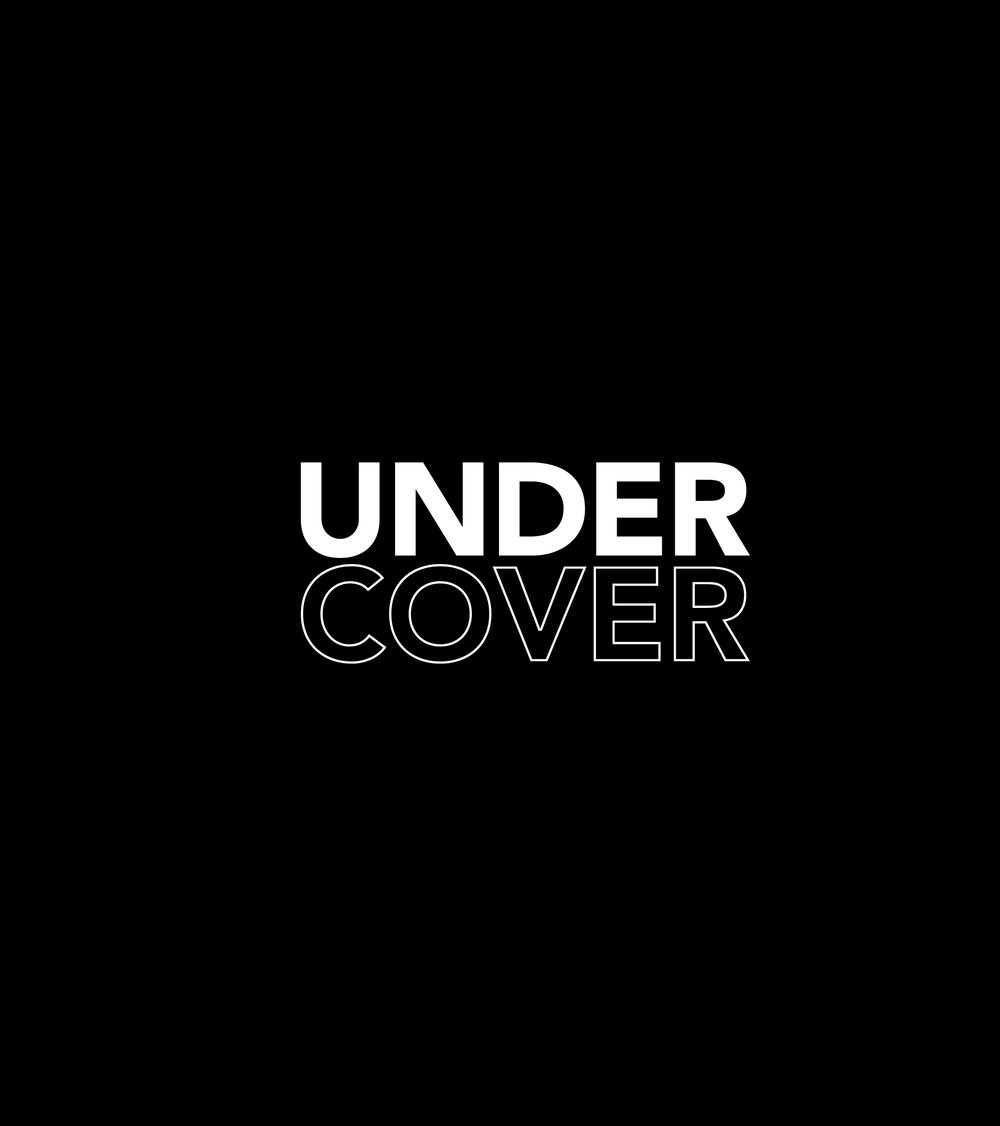 UNDER COVER wordmark concept, solid over outline, white on black